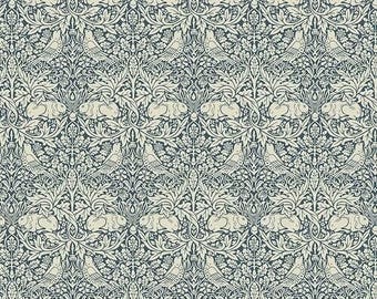 May include: A repeating pattern fabric featuring a detailed design of birds, rabbits, and foliage in a dark blue and cream color scheme. The intricate pattern is reminiscent of classic textile designs, with a symmetrical arrangement of the elements.