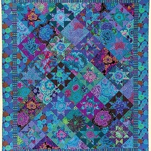 The image is a vibrant and colorful quilt with a variety of patterns and textures, including stars, flowers, and geometric shapes in shades of blue, purple, and green.