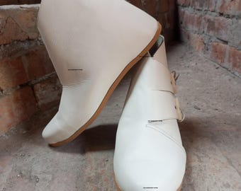 Rustic Leather Lace-Up Shoes: Handmade Bone Toggle Ankle Boots.