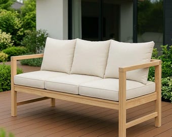 May include: A three-seat outdoor sofa constructed from light-toned wood with a natural finish. The sofa features three thick, rectangular off-white seat cushions and three matching back cushions, all with clean, straight-edged frames.