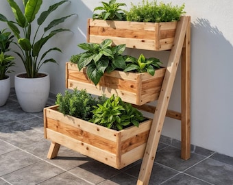 May include: A three-tiered wooden planter with various green plants. The planter has a natural wood finish and a ladder-like support structure. The plants include herbs and leafy greens, creating a vibrant display for a garden or patio.