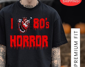 80年代ホラーシャツが大好き | スラッシャー映画のグラフィックTシャツ、レトロなVHSテープデザイン、ベラキャンバスホラーシャツ、不気味で面白いハロウィンギフト