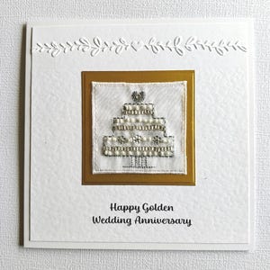 Tarjeta de aniversario de bodas de oro hecha a mano.
