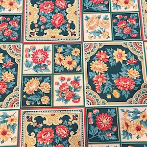 May include: A fabric pattern featuring a grid of alternating rectangular and square panels. The design displays clusters of red and yellow flowers with green leaves set against dark teal and cream backgrounds, accented by decorative gold scrollwork.