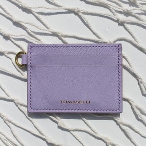 Cartera de piel cosida a mano