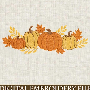 May include: An embroidered design featuring four pumpkins in shades of orange and yellow, with brown stems. The pumpkins are surrounded by fall leaves in yellow and orange. The text "DIGITAL EMBROIDERY FILE" is at the bottom.