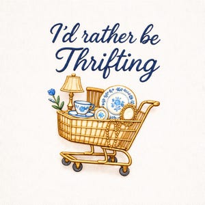 May include: A gold shopping cart filled with vintage items, including a lamp, teacup, plates, and jewelry. The cart has the text "I'd rather be Thrifting" in navy blue script.