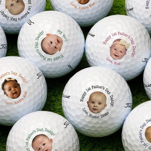 All available color options for 1st Fathers Day photo design are shown across multiple golf balls: Black, Blue, Green, Orange, Pink