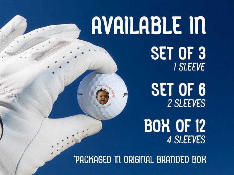 Image: Hand holding golf ball with 1st Fathers Day photo design in orange color option Text: Available in Set of 3 (1 Sleeve), Set of 6 (2 Sleeves), Box of 12 (4 Sleeves) *Packaged in original branded box