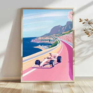 Poster stilizzato di un'auto da corsa, stampa artistica di un suggestivo paesaggio costiero.