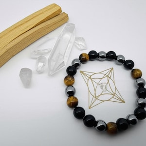 Pulseira de proteção tripla com contas de olho de tigre natural, hematita e obsidiana negra para aterramento, força, cura energética e meditação