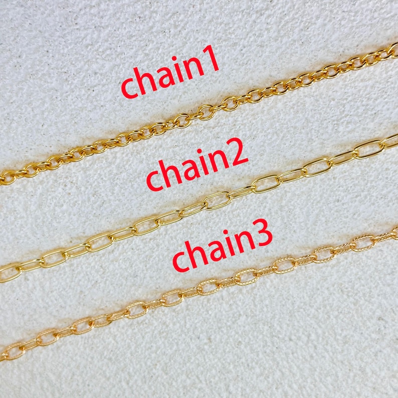 May include: Three gold-colored metal chains arranged horizontally. The top chain, labeled chain1, features small round links. The middle chain, labeled chain2, has elongated oval links. The bottom chain, labeled chain3, consists of textured oval links.