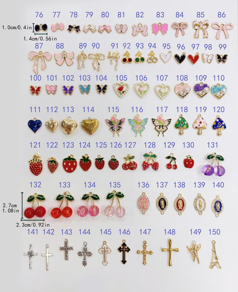 May include: A collection of metal charms numbered 76 through 150, featuring various shapes including bows, hearts, cherries, butterflies, strawberries, crosses, and religious icons. Some charms include enamel colors, pearls, or beads. Dimensions are shown.
