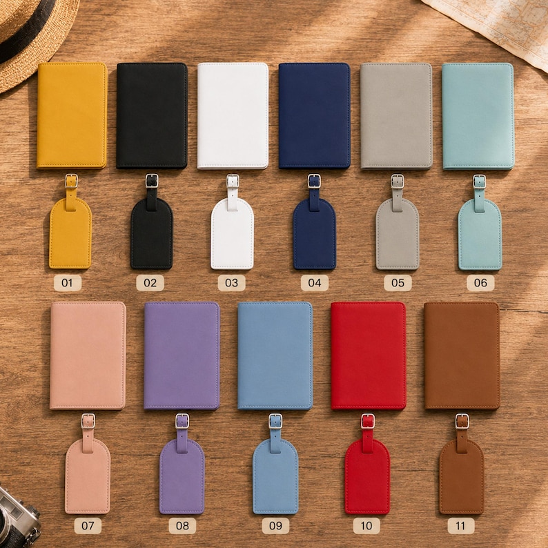 May include: A collection of eleven passport holders and matching luggage tags in various solid colors, including yellow, black, white, navy, gray, light blue, pink, purple, blue, red, and brown, each labeled with a numbered tag from 01 to 11.