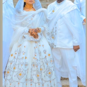 Ethiopian & Eritrean Couple Outfit Set | Habesha Kemis and Men’s Traditional Wear