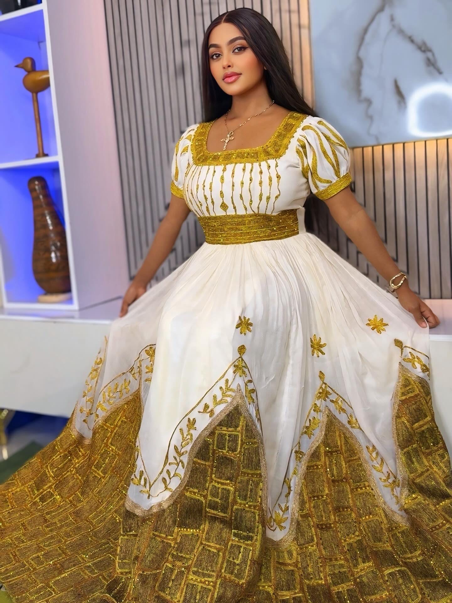 gold ethiopian dress Ethiopian Traditional Dress