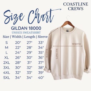 May include: A beige Gildan 18000 unisex sweatshirt displayed on a hanger, with a size chart overlay. The chart lists sizes S to 5XL, with measurements in inches for width, length, and sleeve. The text "Size Chart" is at the top.