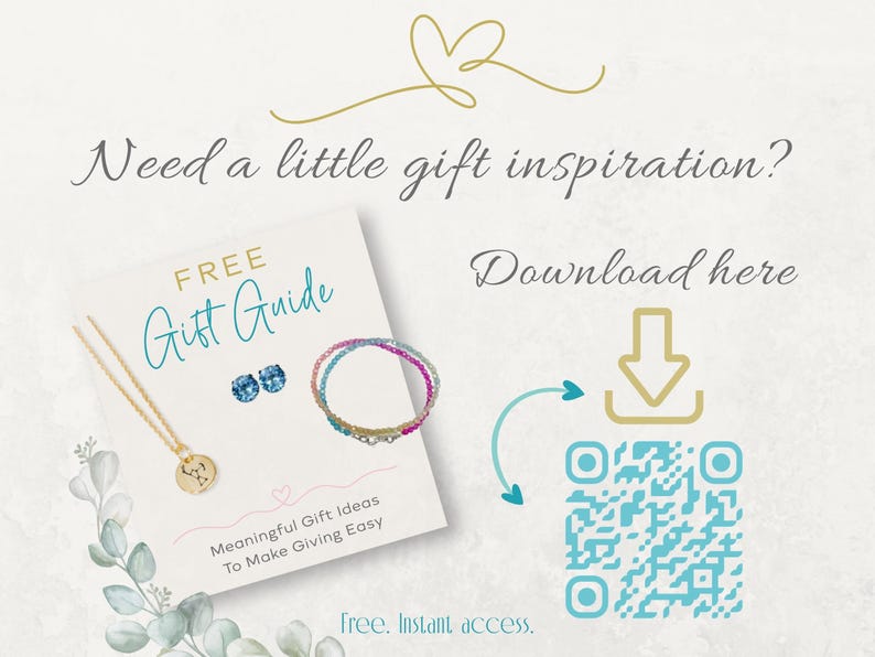 May include: A white card titled FREE Gift Guide featuring a gold necklace with a circular pendant, blue stud earrings, and a multi-coloured beaded bracelet. The card includes the text Meaningful Gift Ideas To Make Giving Easy and a QR code.