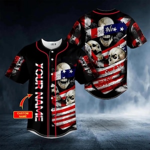 May include: Black baseball jersey with red trim, featuring a design of skulls, an American flag, and the text "YOUR NAME" vertically down the front. The back of the jersey also displays skulls and the flag with the words "See No, Hear No, Speak No".