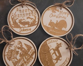 May include: Four wooden Christmas ornaments with twine hangers. Each ornament features a laser-cut design with the words "Merry Christmas" and a family name. The designs include a deer, elk, and turkeys.