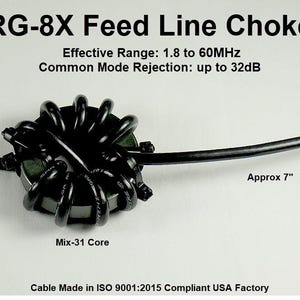 May include: An RG-8X Feed Line Choke with a Mix-31 core, featuring a PL-259 male connector and an SO-239 female connector. The cable has an effective range of 1.8 to 60MHz and common mode rejection up to 32dB, with 7.62cm and 17.78cm cable segments.