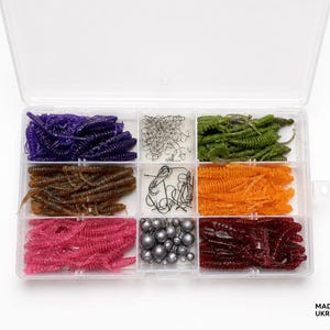 Kit de micro pesca con 180 señuelos de silicona suave perfumados, anzuelos, plomos y caja de aparejos.