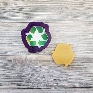 Recyclingsymbool koekjes uitsteker en fondant uitsteker en klei uitsteker