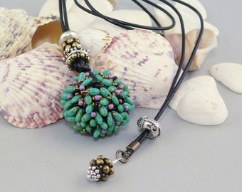 Sea Anemone or Urchin Bead necklace, adjustable length leather cord, clasp free, easy art to wear
