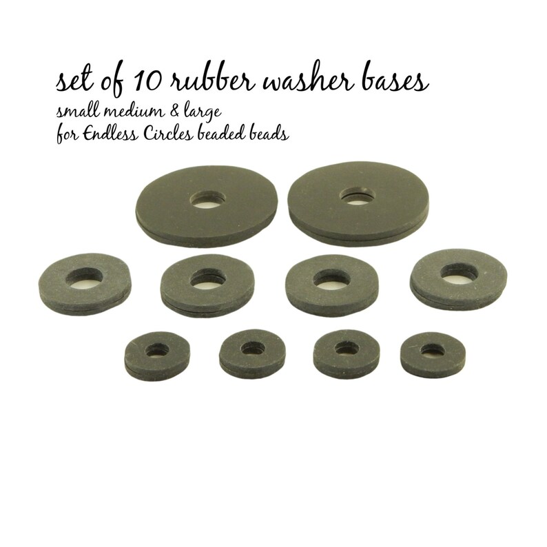 Set of 10 black rubber washer bases in various sizes, labeled "small medium & large" and "for Endless Circles beaded beads".