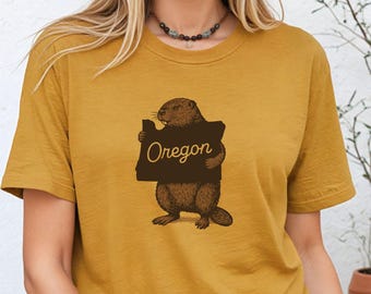 オレゴンビーバーハグシャツ - ヴィンテージスタイルのステートプライドTシャツ、ソフトなユニセックスオレゴンTシャツ