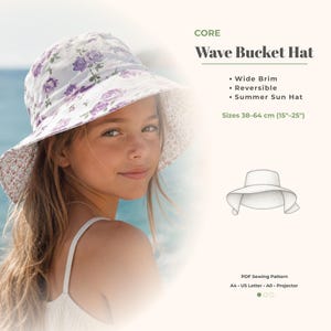 Puede incluir: Un sombrero Wave Bucket reversible con ala ancha, con un estampado floral en el exterior y un estampado contrastante en el interior. El sombrero está diseñado para la protección solar de verano y está disponible en tallas de 38-64 cm (15"-25"). El texto "CORE Wave Bucket Hat" también está presente.
