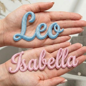 May include: A rustic wooden sign with the text "Welcome to our home" in white lettering. The sign features a distressed finish and a simple, inviting design, perfect for entryway decor.