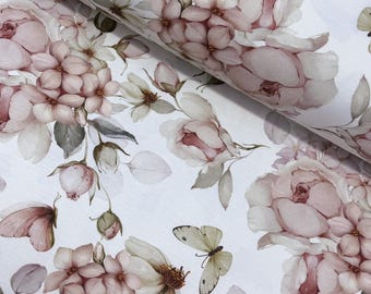 May include: White fabric with a repeating pattern of pink roses, butterflies, and foliage. The design features watercolor-style illustrations of flowers and insects, creating a soft, romantic aesthetic. The fabric is rolled, showing the pattern's continuity.