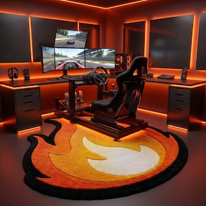 May include: A modern gaming setup featuring a racing simulator with a steering wheel, pedals, and a black seat. The room has multiple monitors displaying a racing game, a flame-shaped rug, and orange ambient lighting.