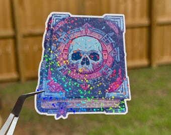 Skull Book Vinyl Sticker | Holographic Witchy Grimoire Decal