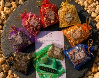May include: A collection of small organza drawstring bags filled with dried herbs and flowers, each with a label including Love, Self Love, Lavender, Protection, Money, Joy, and Clarity, alongside a White Witch Money Attraction Ritual card.