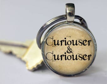 Alice in Wonderland Quote Curiouser and Curiouser Keychain Key Fob in Silver or Bronze