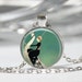 Art Deco Jewelry Woman Riding White Peacock Emerald Green Necklace Art Pendant in Bronze or Silver with Link Chain Included