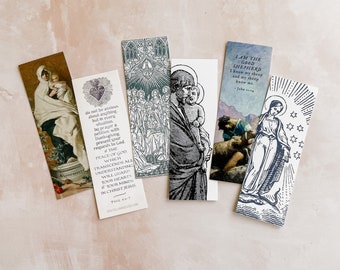 Op de afbeelding: Vijf bladwijzers met religieuze afbeeldingen en tekst. De bladwijzers tonen zwart-wit illustraties van religieuze figuren en scènes. De tekst op de bladwijzers bevat bijbelteksten en citaten over geloof en vrede.