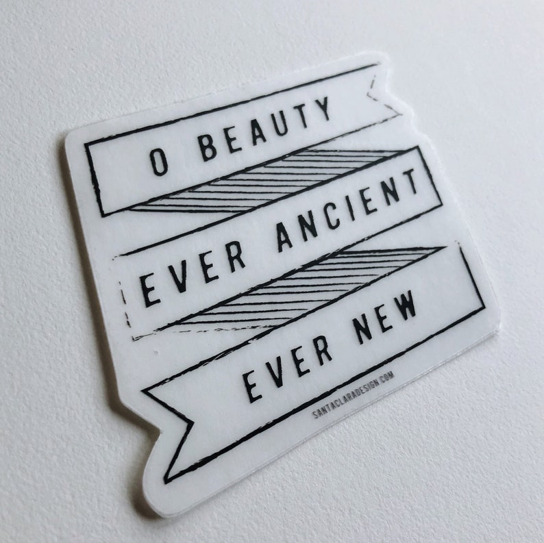 May include: White sticker with black text that reads "O Beauty Ever Ancient Ever New" with a website address at the bottom.