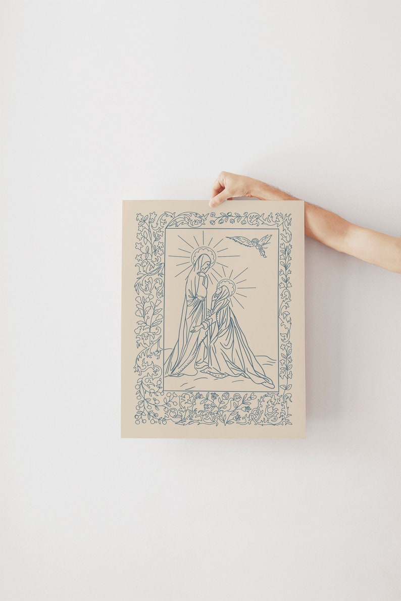 May include: A beige print featuring a blue line drawing of two figures with halos, framed by a floral border. An angel is depicted above. The artwork is held against a white background.