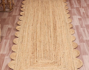 Handmade Jute Scalloped Area Rug: Natural Fiber, Braided Accent