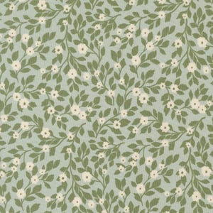May include: A light sage green fabric featuring a repeating pattern of small white flowers with five petals and dark olive green leaves on thin, winding stems. The design is dense and covers the entire surface with a consistent floral motif.