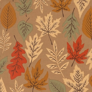 May include: A fabric featuring a repeating pattern of autumn leaves in shades of orange, rust, cream, and sage green set against a solid tan background. The design includes various leaf shapes such as maple, oak, and elm with detailed veins.