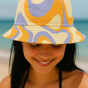 Retro Swirl Bucket Hat, Stylish Sun Protection Hat, Summer Accessory, Handcrafted Gift, Vibrant Outdoor Wear