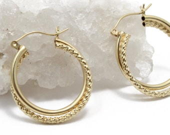 14k Gold Hoop Earrings with a Rope chain design around it in yellow gold
