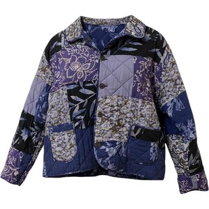 May include: A quilted jacket featuring a patchwork design in shades of blue, purple, and black. The garment has a collared neckline, long sleeves, four front buttons, and two patch pockets. The fabric displays various floral and leaf patterns.