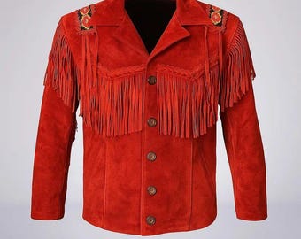 May include: A red suede jacket with fringe detailing across the chest, shoulders, and sleeves. The jacket features decorative embroidery on the shoulders and wooden buttons down the front. The collar is a classic notched style.