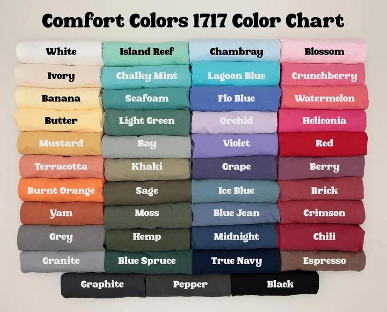 May include: A color chart titled "Comfort Colors 1717 Color Chart" displays a variety of fabric colors. The chart includes shades like white, pink, blue, green, yellow, orange, and grey. Each color is labeled with its name.