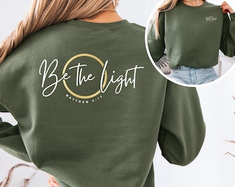 Be The Light Christian Sweatshirt | Unisex Bible Verse Crewneck, Gildan 18000, Religious Gift, Inspirational Faith-Based Apparel
